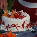 White cake with fresh orange flowers